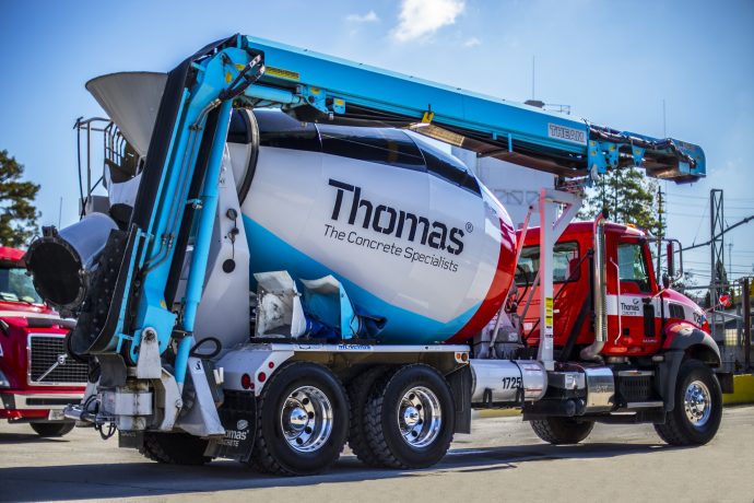 Thomas cement truck in a parking lot.