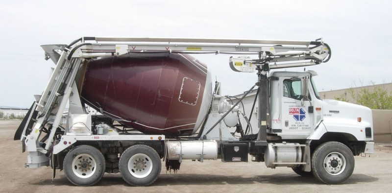 A truck with a concrete mixer attached to it.