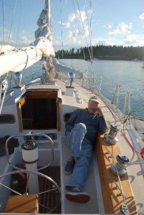 John aboard the sailboat